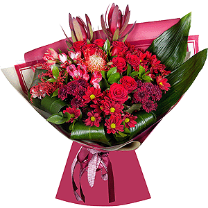 Bacardi Red Spray Chrysanthemum - 4, Red rose 50 cm - 12, Alstromeria Red, Bright Pink - 5, Daisy poms Santini pink, purple - 3, Leukodendron, Aspidistra (1 pc.), Solidago (1 pc.), Wrapping Paper, Ribbon, Ruscus, Nutan
