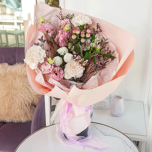 Carnation white, cream - 7, Newton White Spray Chrysanthemum - 1, Alstromeria white, soft pink - 2, Pink Lisianthus (Eustoma) - 2, Hypericum, Limonium (1 pc.), Waxflower (1 pc.), Wrapping Paper