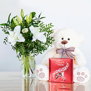 Gift set "Lilies, teddy bear and sweets" with delivery Yaroslavl