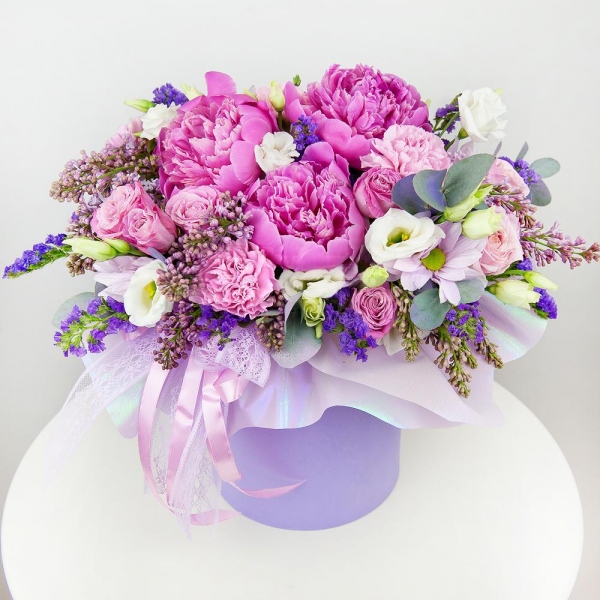 Peony pink - 4, Pink carnation - 4, Peony sprayrose - 4, lisianthus - 3, Lilac Bush - 3, Bacardi Pink Spray Chrysanthemum - 2, Round flower box small , Oasis, Wrapping Paper, Eucalyptus Cinerea, Blue Statice