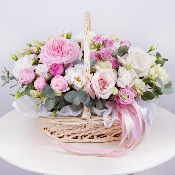 Peony rose pink 'OHara' - 2, White rose 50 cm - 4, Pink rose 50 cm - 3, Bright pink spray rose mix, 50 cm - 6, Carnation white, cream - 4, lisianthus - 4, Medium Basket, Oasis, Eucalyptus Cinerea, Ribbon