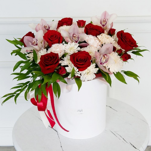 Red rose 50 cm - 11, Pink Cymbidium Orchid Bud - 7, Baltica White Spray Chrysanthemum - 4, Spray rose: red 50 cm - 3, Carnation white, cream - 7, Round flower box medium, Flask for orchids, Oasis, Ruscus italian, Ribbon
