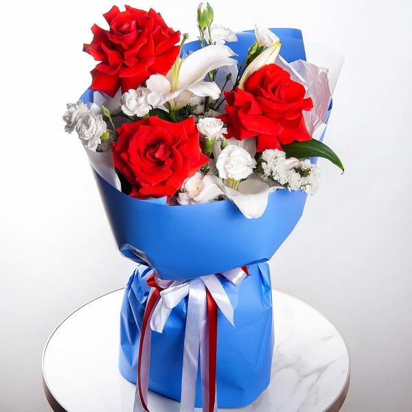 Lilies - 1, Red rose Nina 50 cm - 5, White spray carnation - 3, White statice, Wrapping Paper