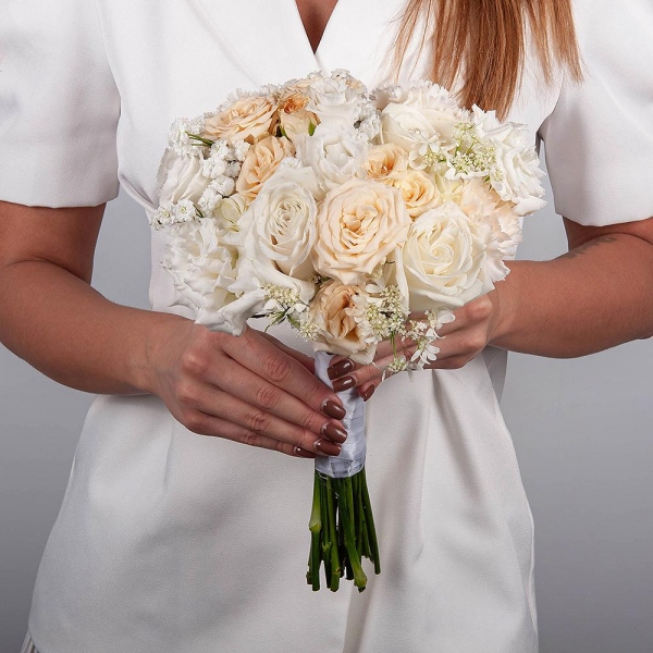 Carnation white, cream - 7, White rose 50 cm Ecuador - 5, Spray rose: white, cream, light pink 50 cm - 2, lisianthus - 4, Gypsophila - 2, Ribbon