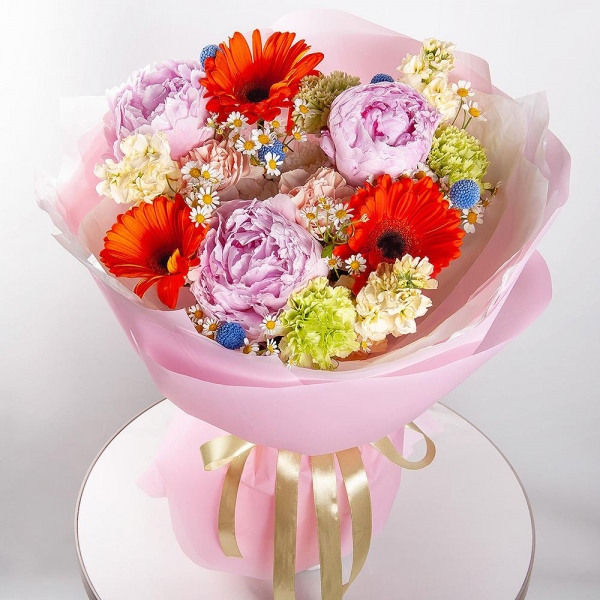 Gerbera daisies - 7, Peony pink - 3, Green carnation - 4, Baltica White Spray Chrysanthemum - 1, Chamomile - 2, White Matthiola - 3, Carnation white, cream - 3, Craspedia, Wrapping Paper
