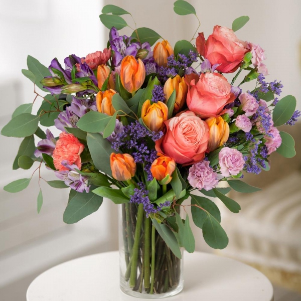 Alstromeria lilac, purple - 5, Orange tulip - 11, Pink spray carnation - 4, Orange carnation - 3, Peony rose Kahala 50 cm - 5, Limonium (1 pc.), Eucalyptus populus (1 pc.), Wrapping Paper, Ribbon