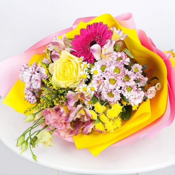 Daisy poms Santini pink, purple - 2, Pink Lisianthus (Eustoma) - 2, Yellow rose 50 cm - 1, Purple gerbera - 2, Alstromeria white, soft pink - 2, Athos poms Stallion - 2, Chamomile - 1, Solidago (1 pc.), Wrapping Paper, Ribbon