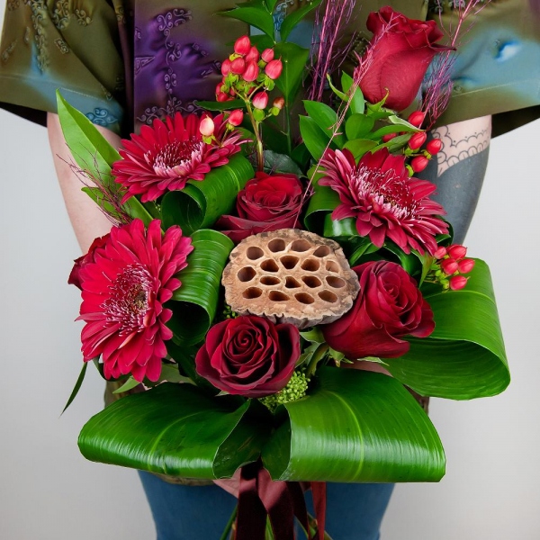 Red rose 50 cm - 9, Gerbera red - 6, Ruscus, Aspidistra (1 pc.), Hypericum, Dried flowers decor, Skimmia, Ribbon
