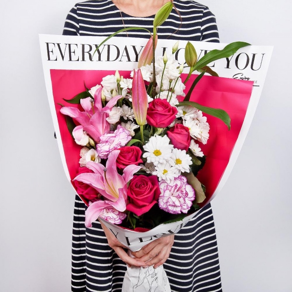 Pink lily - 1, Bacardi White Spray Chrysanthemum - 3, lisianthus - 2, Pink rose 50 cm - 7, Pink carnation - 3, Wrapping Paper