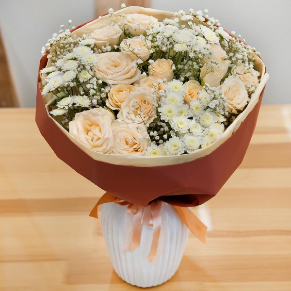 Spray rose: white, cream, light pink 50 cm - 6, Athos poms Stallion - 4, Gypsophila - 2, Wrapping Paper
