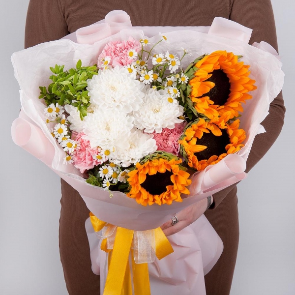 Sunflower - 3, Baltica White Spray Chrysanthemum - 1, Chamomile - 2, Pink carnation - 9, Pistachio, Wrapping Paper
