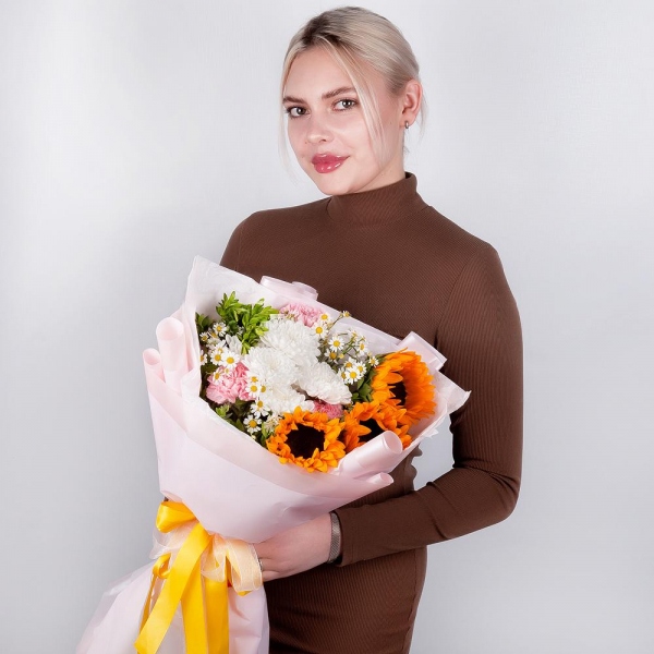 Sunflower - 3, Baltica White Spray Chrysanthemum - 1, Chamomile - 2, Pink carnation - 9, Pistachio, Wrapping Paper