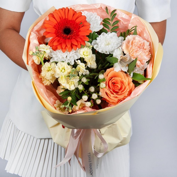 Gerbera daisies - 1, Baltica White Spray Chrysanthemum - 1, White Matthiola - 1, Alstromeria white, soft pink - 3, Pink carnation - 4, Rose Cream 50 cm - 1, Hypericum, Pistachio, Wrapping Paper
