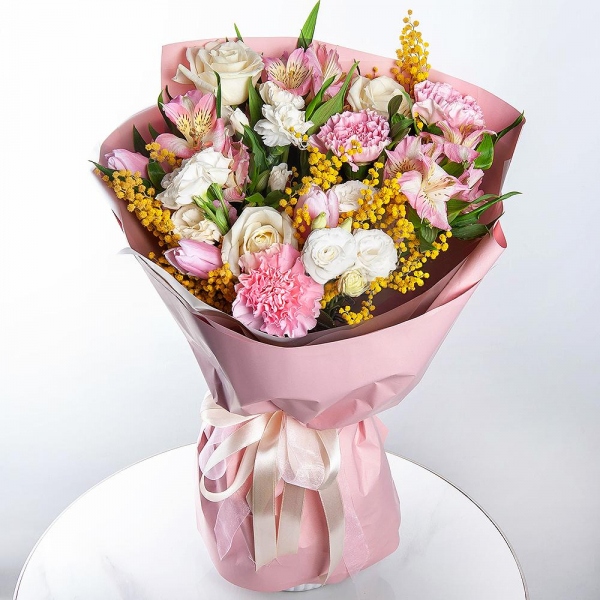 White rose 50 cm - 3, Alstromeria white, soft pink - 3, White spray carnation - 1, lisianthus - 1, Pink tulip - 7, Mimosa - 1, Pink carnation - 5, Wrapping Paper