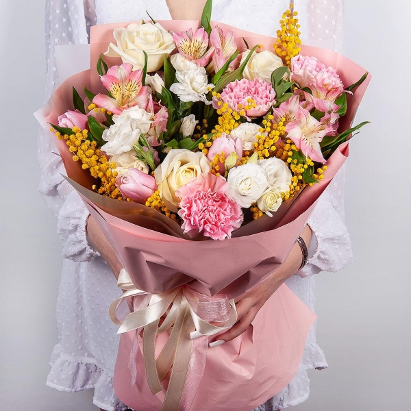 White rose 50 cm - 3, Alstromeria white, soft pink - 3, White spray carnation - 1, lisianthus - 1, Pink tulip - 7, Mimosa - 1, Pink carnation - 5, Wrapping Paper